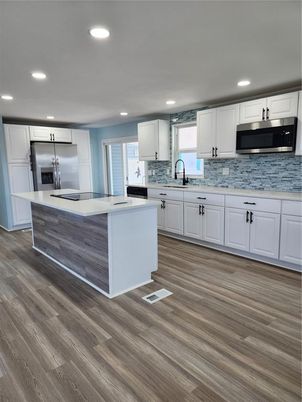Interior, Kitchen, Recessed Lighting, Stainless Steel Appliances, Wood Texture Flooring