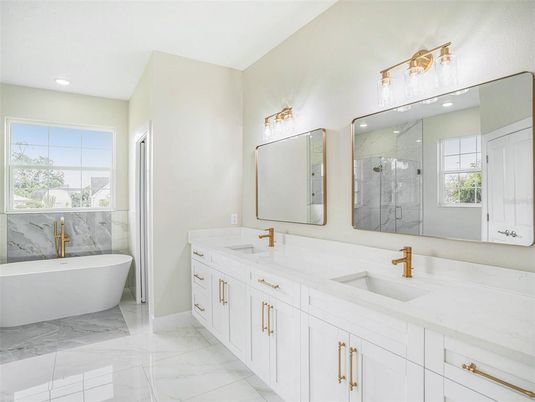 Bathroom, Dual Sink Vanities, Free Standing Baths, Glass Shower, Interior, Marble, Marble Walls, Recessed Lighting