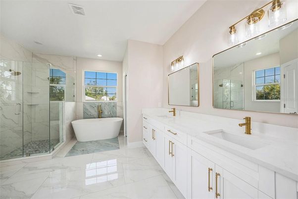 Bathroom, Dual Sink Vanities, Free Standing Baths, Glass Shower, Interior, Marble, Marble Walls, Recessed Lighting