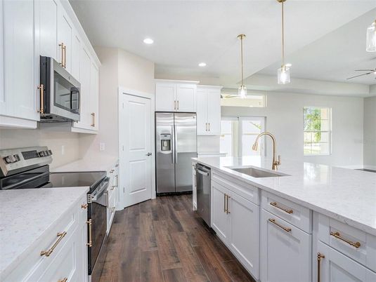 Interior, Kitchen, Pendant Lights, Recessed Lighting, Stainless Steel Appliances, Wood Texture Flooring