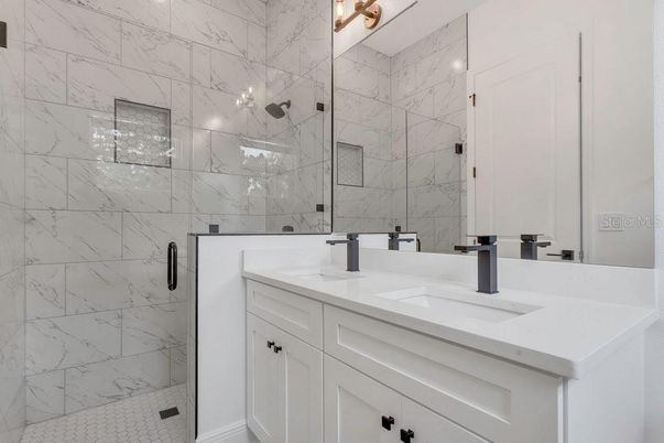 Bathroom, Dual Sink Vanities, Glass Shower, Interior, Marble Walls