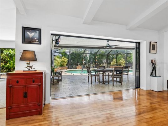 Dining room, Interior, Pool, Sun Room, Wood Texture Flooring