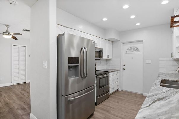 Interior, Kitchen, Recessed Lighting, Stainless Steel Appliances, Wood Texture Flooring