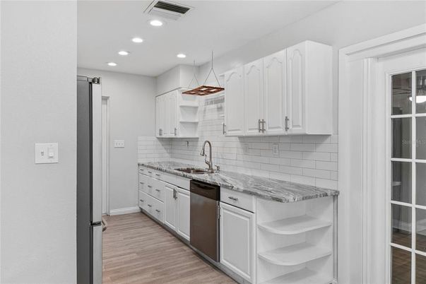 Interior, Kitchen, Pendant Lights, Recessed Lighting, Stainless Steel Appliances, Wood Texture Flooring