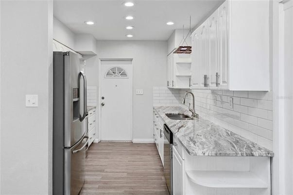 Interior, Kitchen, Pendant Lights, Recessed Lighting, Stainless Steel Appliances, Wood Texture Flooring