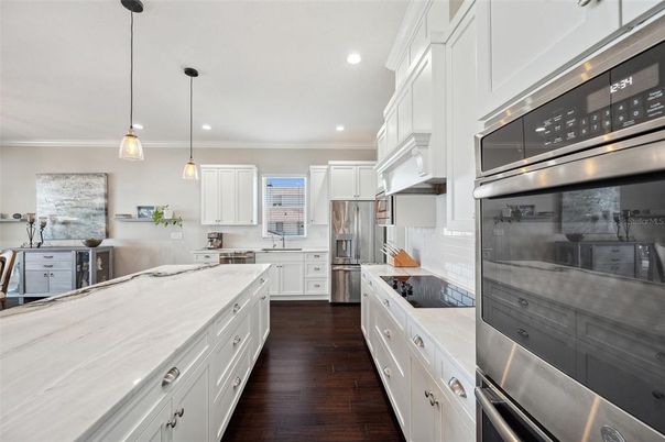 Interior, Kitchen, Pendant Lights, Recessed Lighting, Stainless Steel Appliances, Wood Texture Flooring