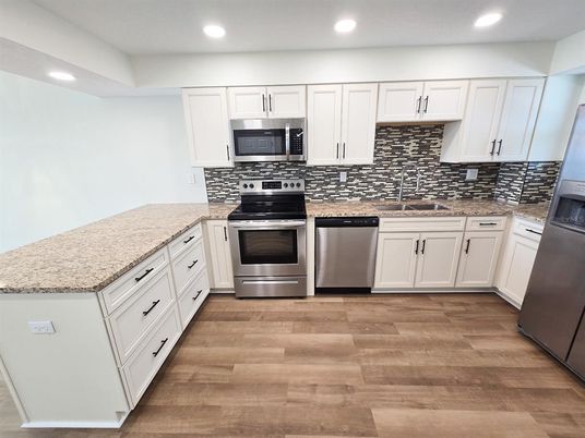 Interior, Kitchen, Recessed Lighting, Stainless Steel Appliances, Wood Texture Flooring