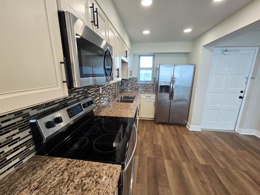 Interior, Kitchen, Recessed Lighting, Stainless Steel Appliances, Wood Texture Flooring