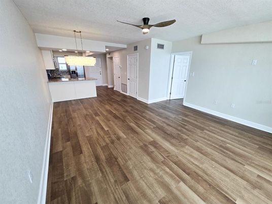 Empty room, Interior, Kitchen, Pendant Lights, Recessed Lighting, Wood Texture Flooring