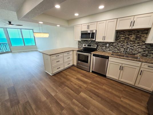 Interior, Kitchen, Recessed Lighting, Stainless Steel Appliances, Wood Texture Flooring
