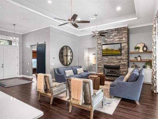 Fireplace, Interior, Living room, Pendant Lights, Recessed Lighting, Stone Walls, Wood Texture Flooring