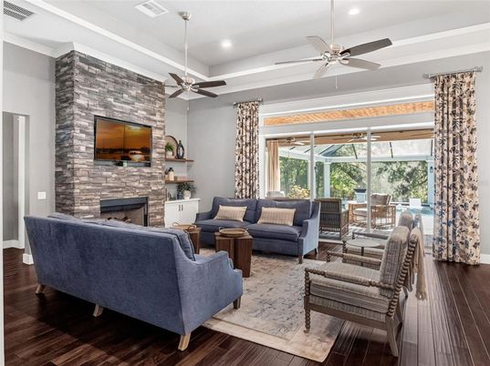 Fireplace, Interior, Living room, Recessed Lighting, Stone Walls, Wood Texture Flooring