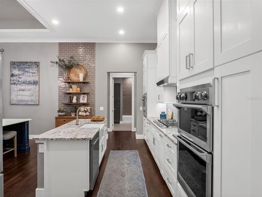 Interior, Kitchen, Recessed Lighting, Stainless Steel Appliances, Stone Walls, Wood Texture Flooring