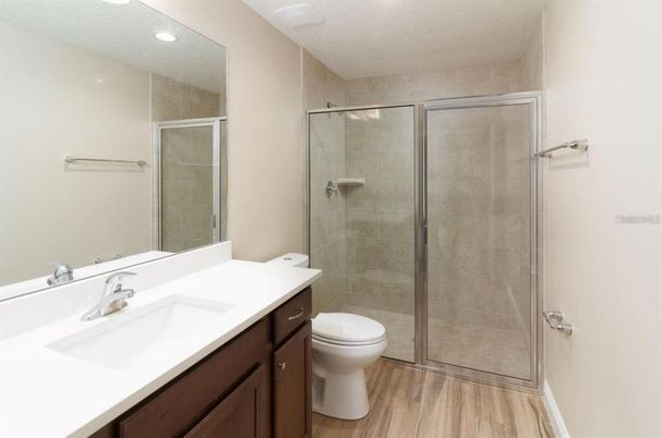 Bathroom, Glass Shower, Interior, Recessed Lighting, Wood Texture Flooring