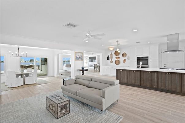 Dining room, Interior, Kitchen, Living room, Pendant Lights, Recessed Lighting, Water, Wood Texture Flooring