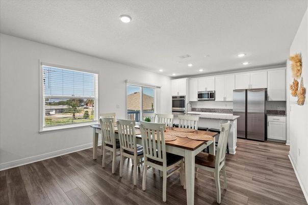 Dining room, Interior, Kitchen, Recessed Lighting, Stainless Steel Appliances, Wood Texture Flooring