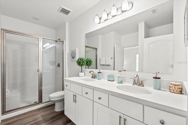 Bathroom, Dual Sink Vanities, Glass Shower, Interior, Wood Texture Flooring