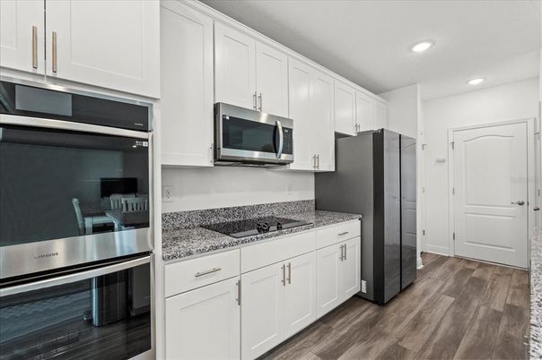 Interior, Kitchen, Recessed Lighting, Stainless Steel Appliances, Wood Texture Flooring