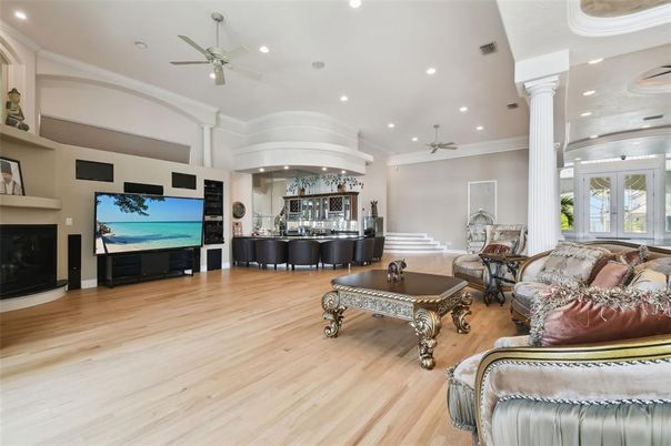 Fireplace, Interior, Living room, Piano, Recessed Lighting, Wood Texture Flooring