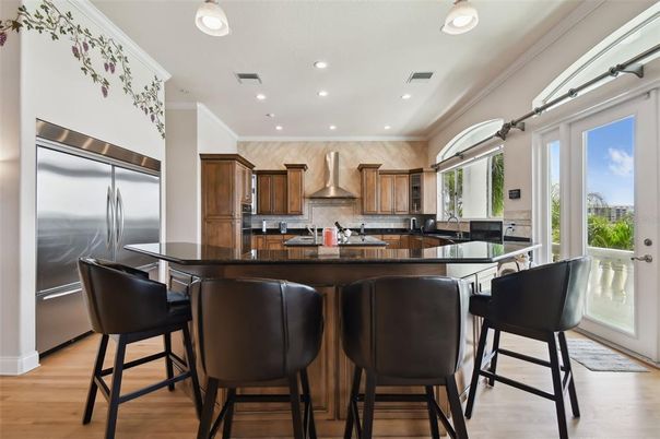 Dining room, Interior, Kitchen, Recessed Lighting, Stainless Steel Appliances, Wood Texture Flooring