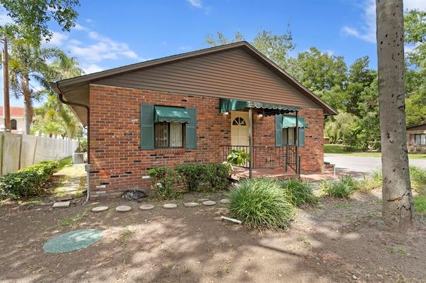 Exterior, Facade, Brick Facade, Log Home