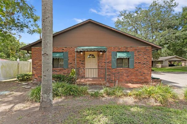 Exterior, Facade, Brick Facade, Log Home