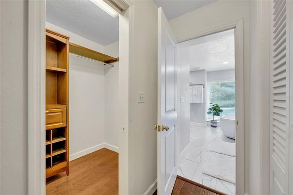 Bathroom, Interior, Marble, Recessed Lighting, Walk-in Closets, Wood Texture Flooring