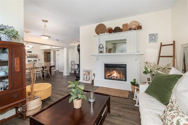 Dining room, Fireplace, Interior, Living room, Pendant Lights, Wood Texture Flooring