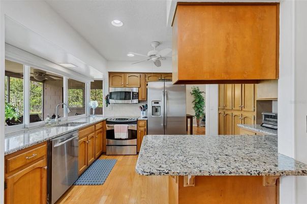Interior, Kitchen, Recessed Lighting, Stainless Steel Appliances, Wood Texture Flooring