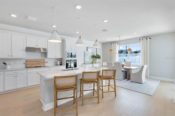 Dining room, Interior, Kitchen, Pendant Lights, Recessed Lighting, Stainless Steel Appliances, Wood Texture Flooring
