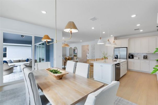 Dining room, Interior, Kitchen, Living room, Pendant Lights, Recessed Lighting, Stainless Steel Appliances, Wood Texture Flooring