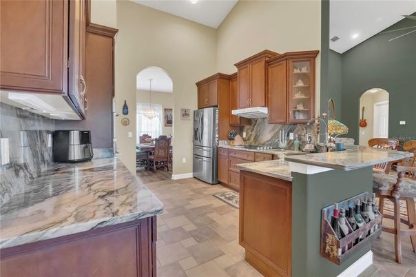 Chandelier, Dining room, Interior, Kitchen, Pendant Lights, Recessed Lighting, Stainless Steel Appliances