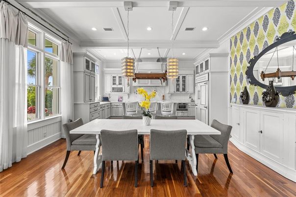 Dining room, Interior, Kitchen, Pendant Lights, Recessed Lighting, Stainless Steel Appliances, Wood Texture Flooring