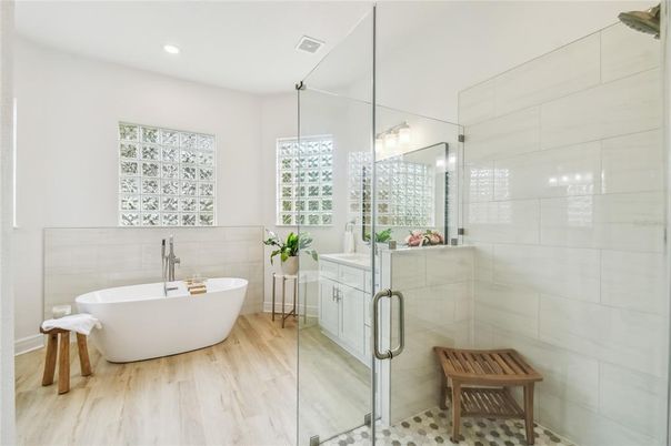 Bathroom, Free Standing Baths, Glass Shower, Interior, Recessed Lighting, Wood Texture Flooring