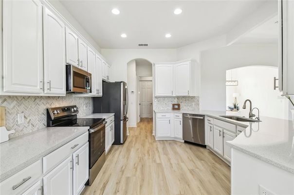 Interior, Kitchen, Recessed Lighting, Stainless Steel Appliances, Wood Texture Flooring