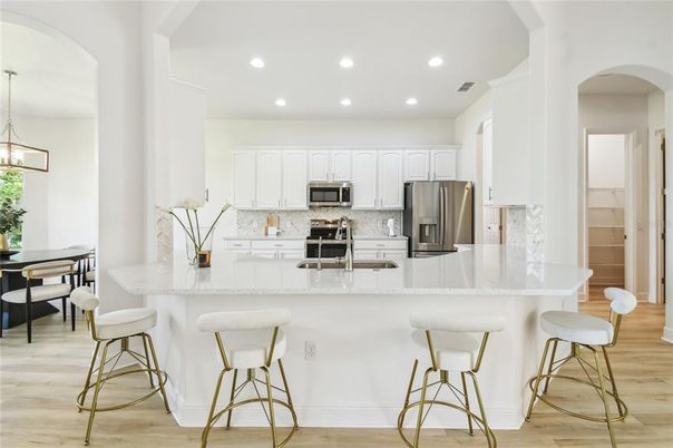 Interior, Kitchen, Pendant Lights, Recessed Lighting, Stainless Steel Appliances, Wood Texture Flooring