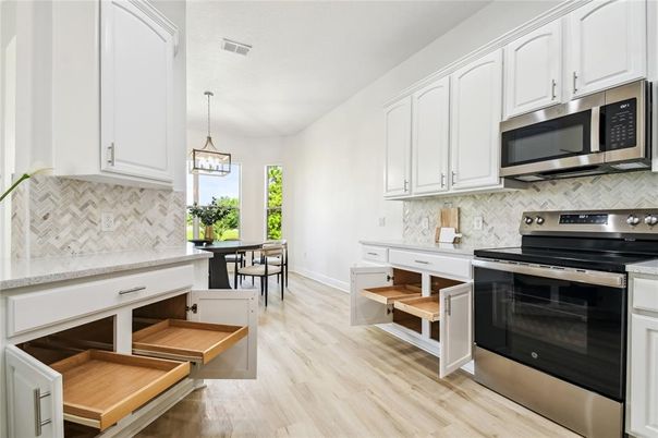 Dining room, Interior, Kitchen, Pendant Lights, Stainless Steel Appliances, Wood Texture Flooring