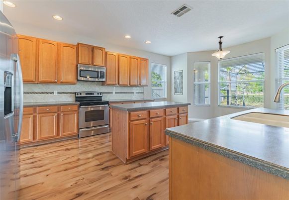 Interior, Kitchen, Pendant Lights, Recessed Lighting, Stainless Steel Appliances, Wood Texture Flooring