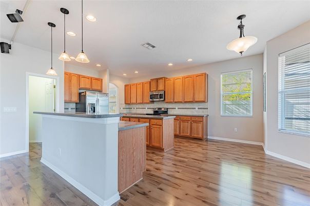 Interior, Kitchen, Pendant Lights, Recessed Lighting, Stainless Steel Appliances, Wood Texture Flooring