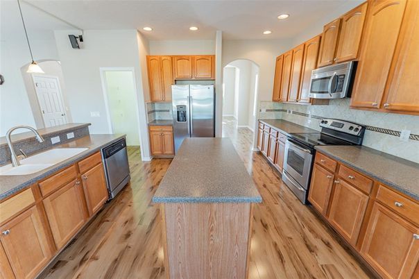 Interior, Kitchen, Pendant Lights, Recessed Lighting, Stainless Steel Appliances, Wood Texture Flooring