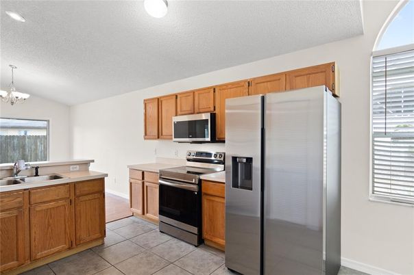 Chandelier, Interior, Kitchen, Stainless Steel Appliances, Wood Texture Flooring