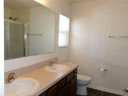 Bathroom, Dual Sink Vanities, Glass Shower, Interior, Wood Texture Flooring
