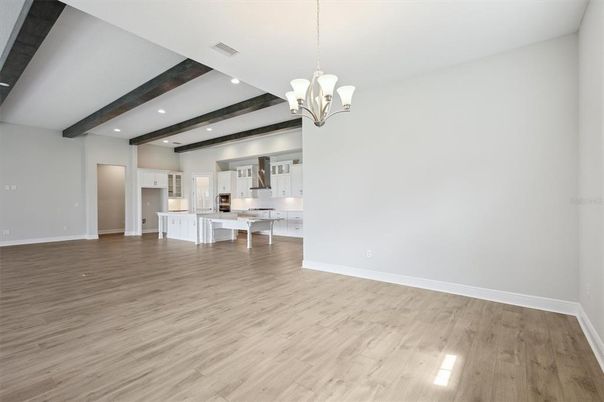 Chandelier, Empty room, Interior, Kitchen, Recessed Lighting, Wooden Beams, Wood Texture Flooring