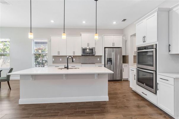 Interior, Kitchen, Pendant Lights, Recessed Lighting, Stainless Steel Appliances, Wood Texture Flooring