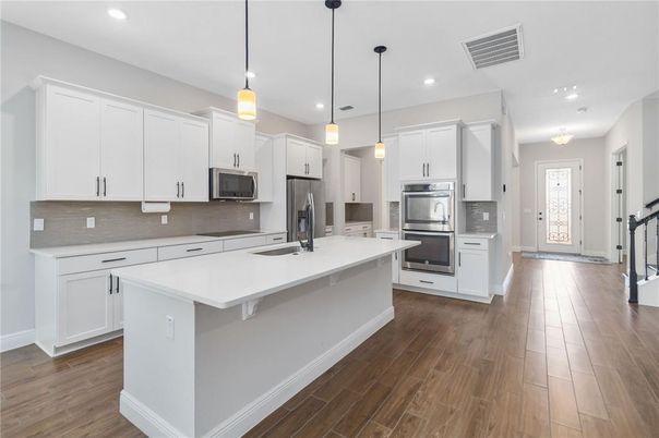 Interior, Kitchen, Pendant Lights, Recessed Lighting, Stainless Steel Appliances, Wood Texture Flooring