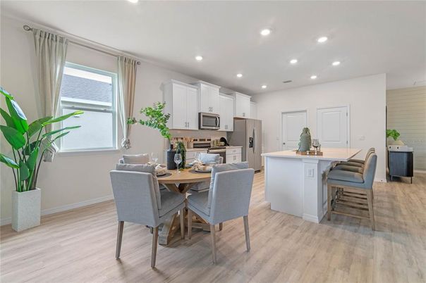 Dining room, Interior, Kitchen, Recessed Lighting, Stainless Steel Appliances, Wood Texture Flooring