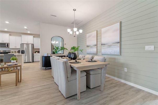 Chandelier, Dining room, Interior, Kitchen, Pendant Lights, Recessed Lighting, Stainless Steel Appliances, Wood Texture Flooring