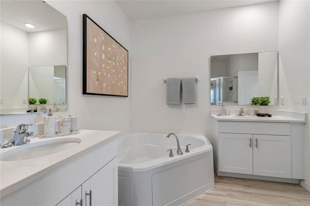 Bathroom, Dual Sink Vanities, Interior, Recessed Lighting, Wood Texture Flooring