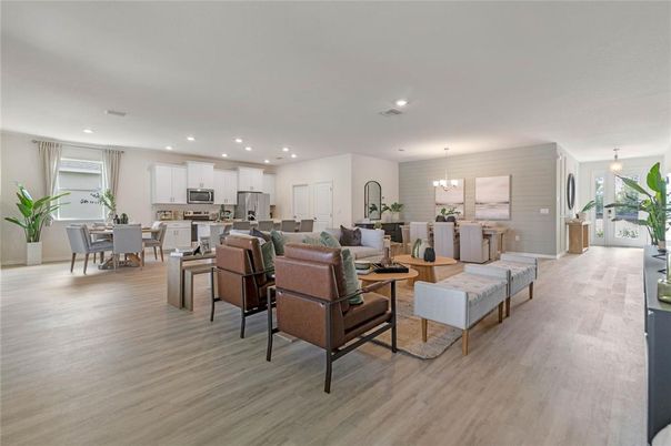 Chandelier, Dining room, Interior, Kitchen, Living room, Pendant Lights, Recessed Lighting, Stainless Steel Appliances, Wood Texture Flooring