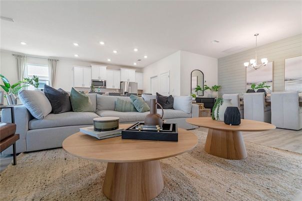 Chandelier, Dining room, Interior, Kitchen, Living room, Recessed Lighting, Stainless Steel Appliances, Wood Texture Flooring